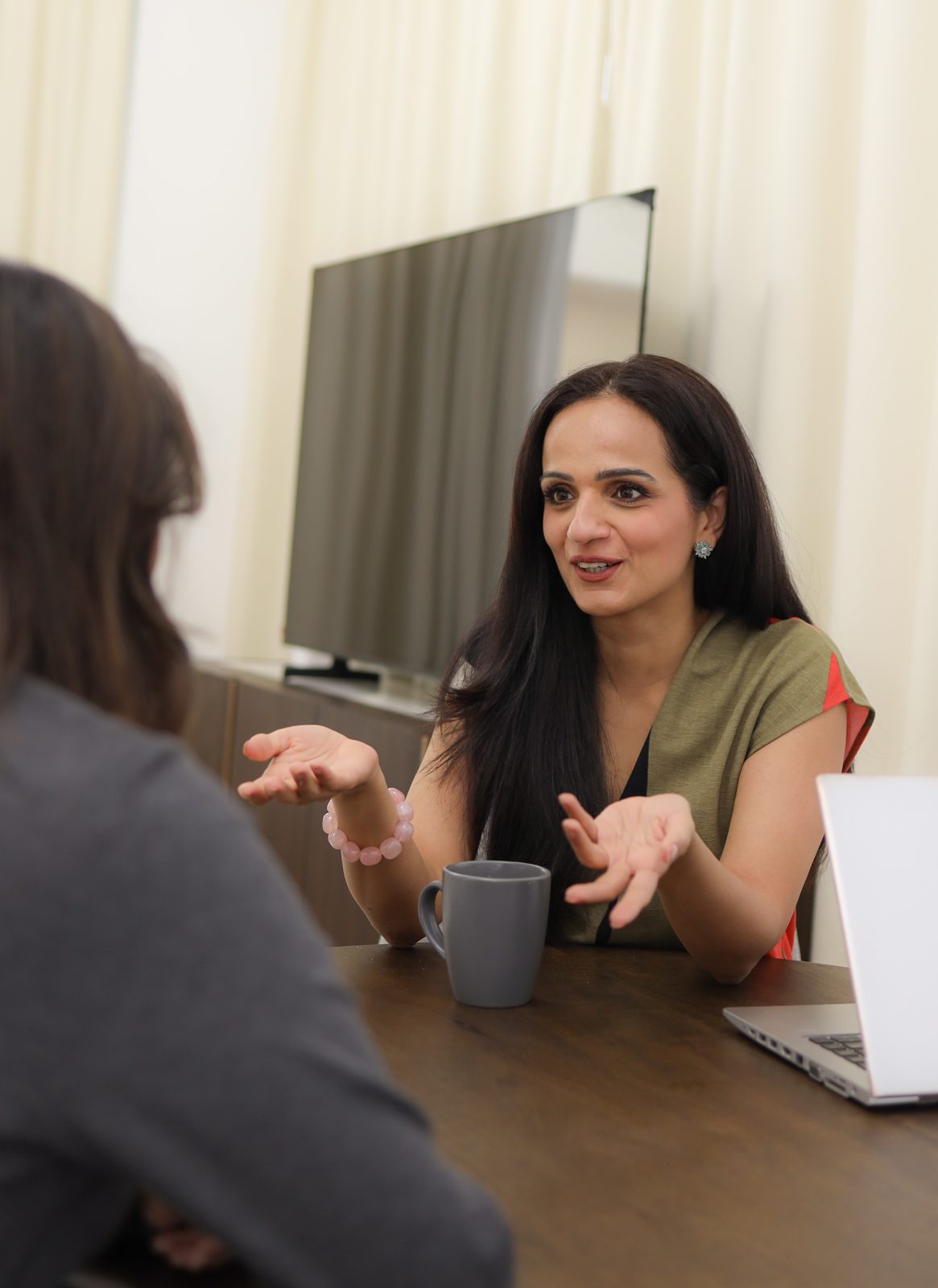 Zainab in a one-to-one wellbeing conversation